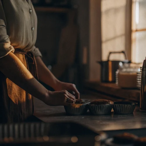 women standing in kitchen